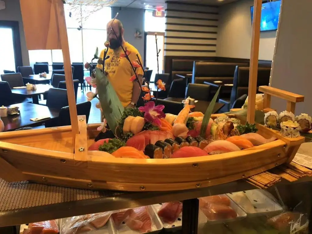 Hibachi-Express-&-Sushi-Japanese-restaurant-Sushi-Boat-Platter-Oklahoma City Elaborate assortment of sushi and sashimi, including nigiri at Hibachi Express & Sushi, a Japanese restaurant in Oklahoma City