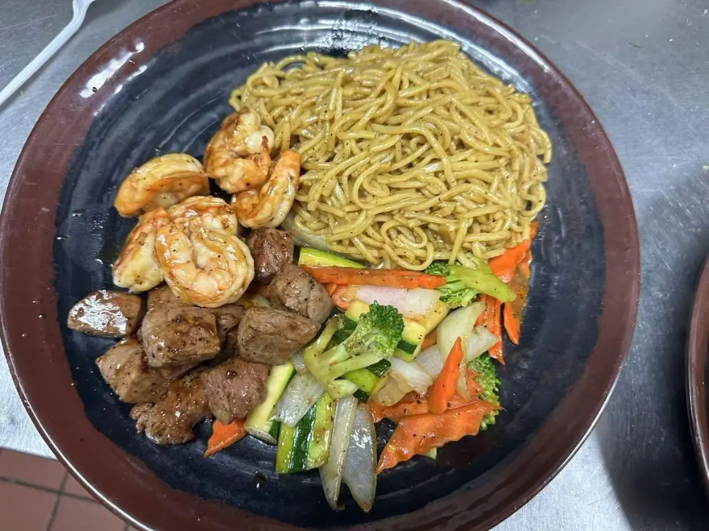 Hibachi-Express-&-Sushi-Japanese-restaurant-Shrimp-And-Steak-Noodle-Plate-Oklahoma City Stir - fried noodles with succulent shrimp, tender steak cubes at Hibachi Express & Sushi, a Japanese restaurant in Oklahoma City