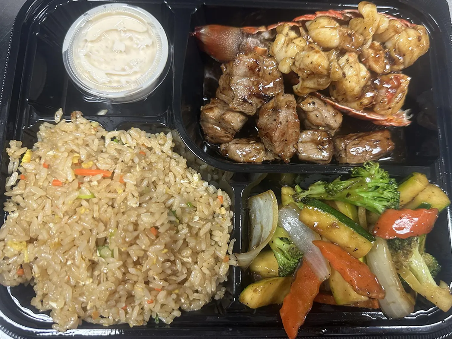 Lobster and Pork Stir-Fry with Fried Rice and Vegetables at Hibachi Express & Sushi, a Japanese restaurant in Oklahoma City
